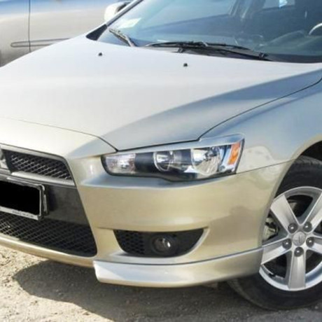 Клыки переднего бампера "Реплика" для Mitsubishi Lancer X купить недорого с доставкой в Пенза